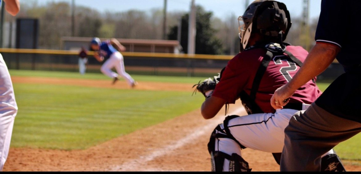 baseball catcher behind the plate during a game